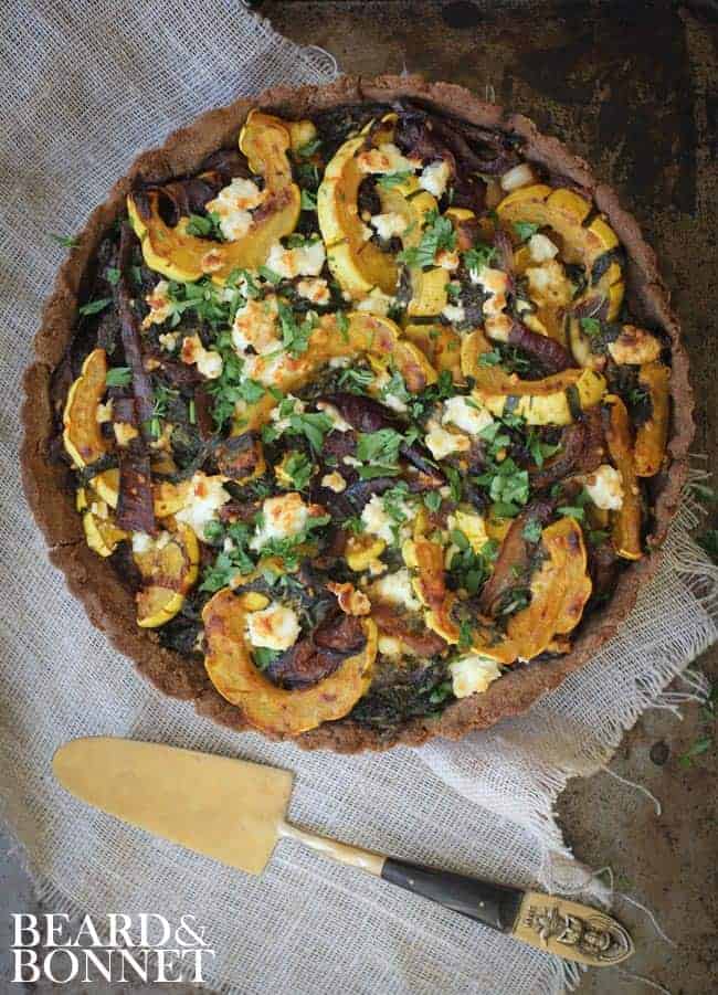 Mixed Baby Greens, Delicata Squash, Caramelized Onions and Feta Tart 